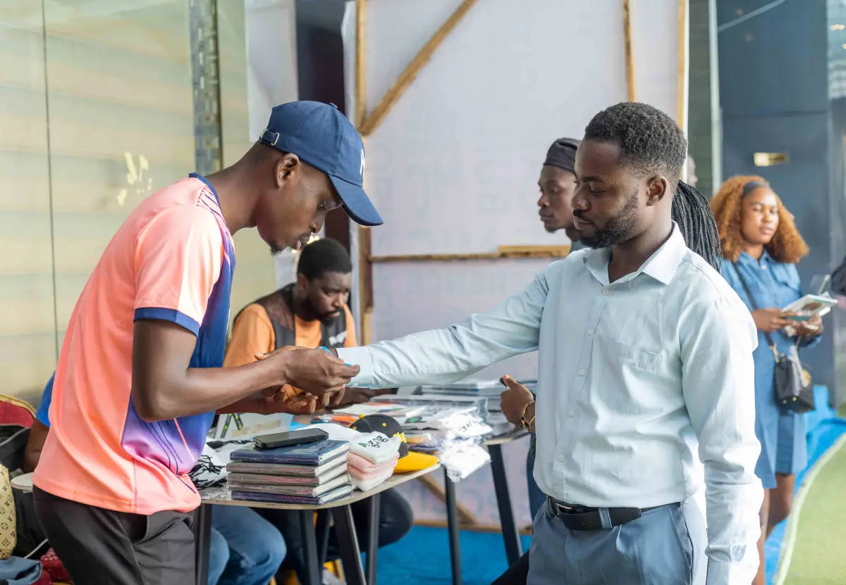 Attendee checking in at an event registration desk